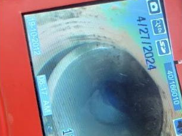 Sewer camera inspection monitor showing a pipe interior in Las Vegas